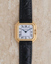 Cartier Ceinture Ref. 6602 in 18K yellow gold, featuring a white Roman numeral dial and black leather strap.