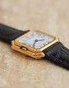 Oblique close-up of the octagonal winding crown integrated into the Cartier Ceinture case.