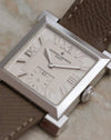 Detailed angled view of the Carrée Historique silvered dial, showing its applied Roman numerals, faceted hands and subsidiary seconds.