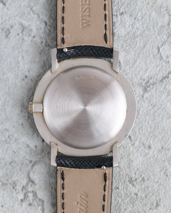 Rear view of the Audemars Piguet showing its circular brushed caseback, angular lugs and leather strap.