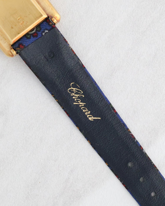 Underside of the original Chopard strap showing the embossed markings and leather lining.