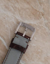 Reverse of the Ralph Lauren-signed stainless steel buckle showing its engraved branding.