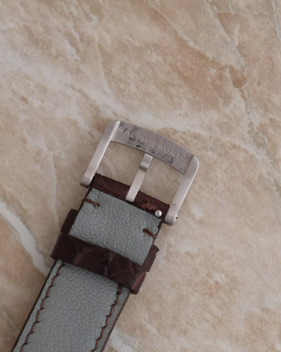 Reverse of the Ralph Lauren-signed stainless steel buckle showing its engraved branding.