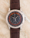 Front view showing the 38.7mm stainless steel case and elm burl wood dial.
