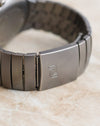 Close-up of the titanium folding clasp on the Porsche Design by IWC Ocean 500, showing the engraved Porsche Design logo.