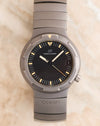 Front view of the 1985 Porsche Design Ocean 500 Ref. 3502 with black dial, tritium markers, titanium case and integrated bracelet.