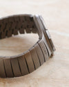 Side view of the Porsche Design Ocean 500 showing the curved titanium case and original bracelet with Ocean engraving.
