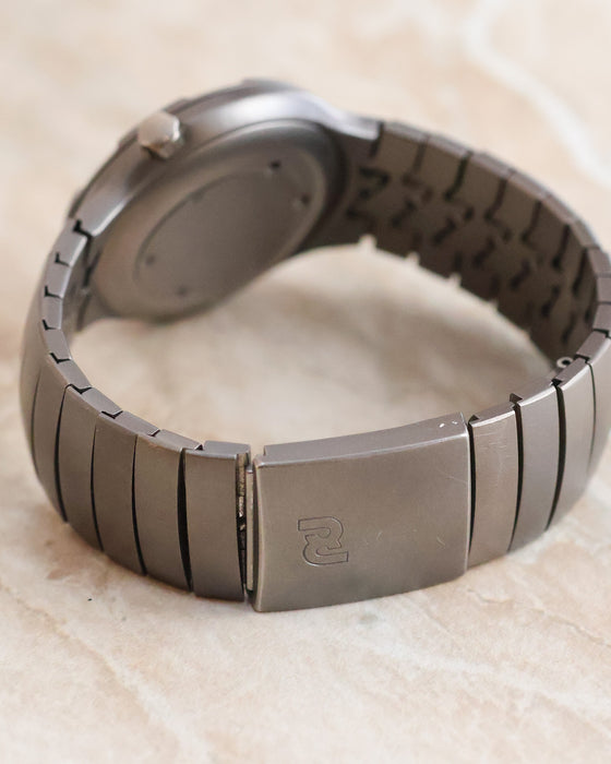 Rear view of the Porsche Design Ocean 500 displaying its titanium folding clasp, bracelet and circular caseback.