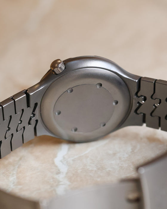 Close-up of the Porsche Design by IWC Ocean 500 titanium caseback, crown and original bracelet construction.