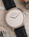 Angled close-up of the white gold Saxonia Thin with minimalist two-hand dial.