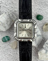 Universal Genève Flower Cushion vintage watch with sculptural stainless steel case and leather strap, 1970s design