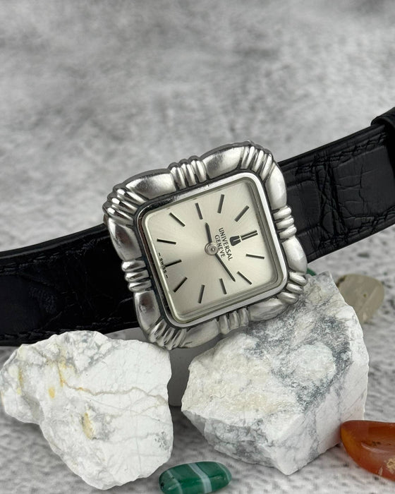 Vintage Universal Genève Flower Cushion wristwatch with rare sculptural stainless steel case and manual movement