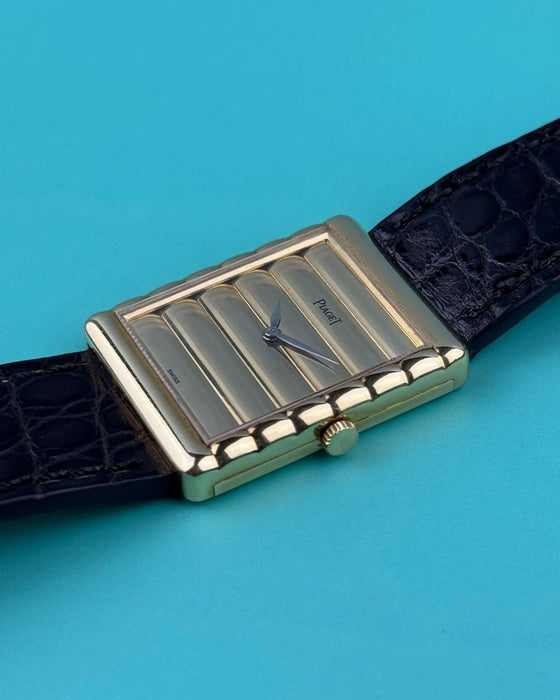 Side view of Piaget Ref. 91480 showing crown placement and ultra-thin 18K gold case profile