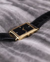 Close-up of the gold crown on the Piaget 9251, set against the polished case edge.