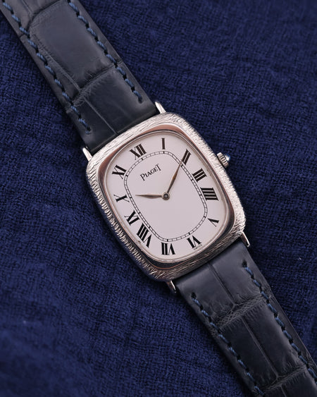 Piaget Ref. 9251 vintage tank watch in 18K white gold with bark-textured case and Roman numeral dial, c. 1980