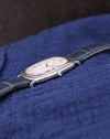 Side angle of Piaget Ref. 9251 displaying cabochon crown and bark-textured 18K white gold case