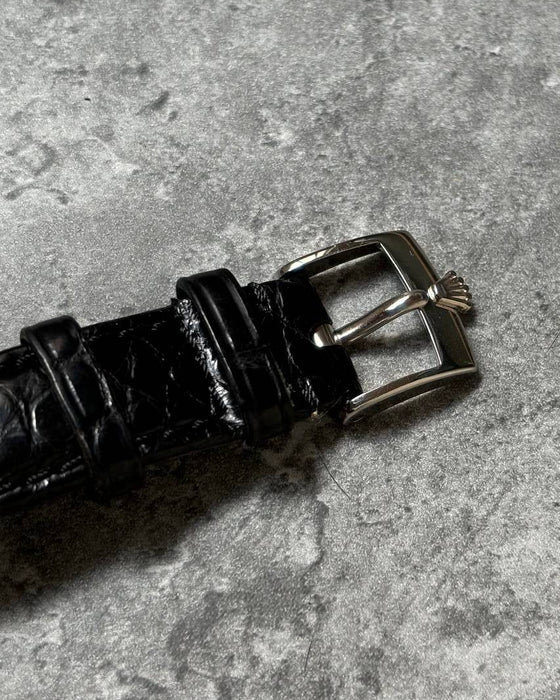 Close-up of Rolex-signed white gold buckle on Cellini leather strap, included with 1997 set