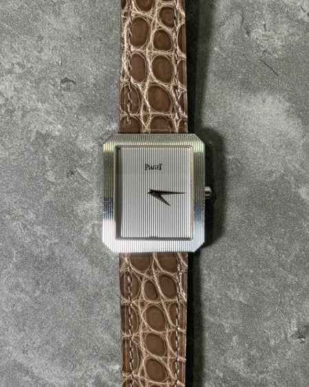 Piaget Protocole 90154 vintage watch in 18K white gold with tapestry-engraved dial and bezel, c. 1990s
