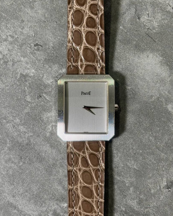 Piaget Protocole 90154 vintage watch in 18K white gold with tapestry-engraved dial and bezel, c. 1990s