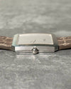 Piaget Protocole 90154 side view with crown, featuring sculpted case and engraved white gold bezel