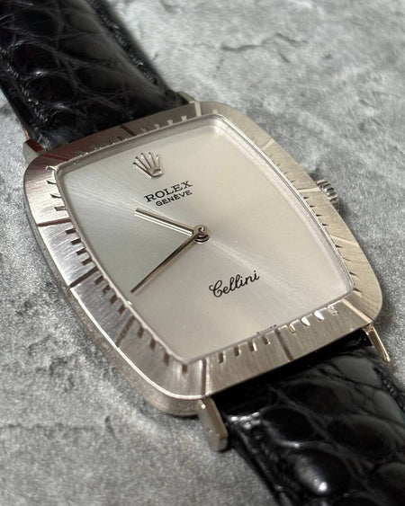 Rolex Cellini Ref. 4087 vintage dress watch with silver sunburst dial and cushion-shaped 18K white gold case