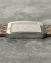 Side profile of Piaget 90154 showcasing sharp white gold case geometry and integrated lugs