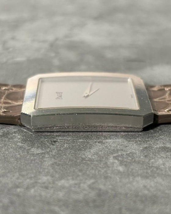 Side profile of Piaget 90154 showcasing sharp white gold case geometry and integrated lugs