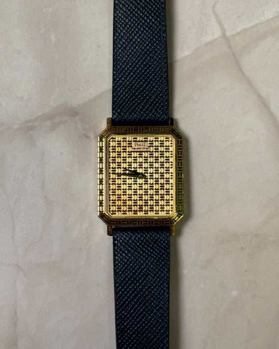 Piaget Ref. 7143 Art Deco watch with 18K gold case and strap, vintage quartz model with sapphire crystal