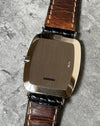 Case back of Rolex Cellini Ref. 4087 in 18K white gold, showcasing elegant cushion shape and vintage detailing