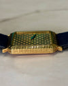 Angular side view of Piaget Ref. 7143 highlighting Art Deco grid structure in yellow gold case