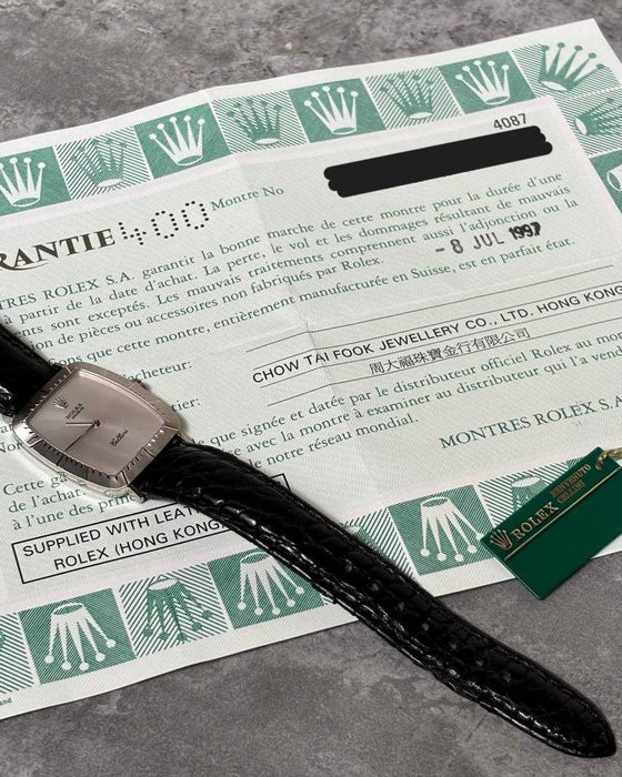 Rolex Cellini 4087 watch displayed with original Rolex papers and 18K white gold buckle, 1997 full set